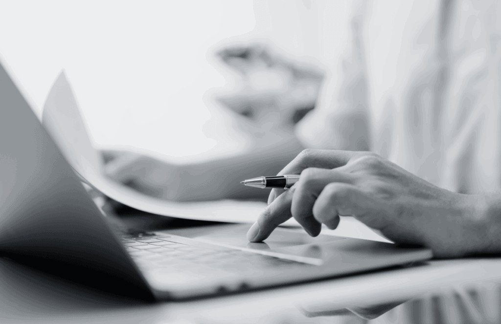 Hands on a keyboard represent accounting and finance recruitment agencies.