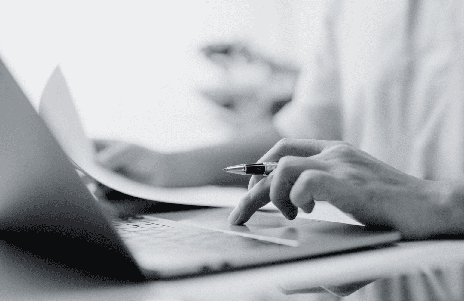 Hands on a keyboard represent accounting and finance recruitment agencies.